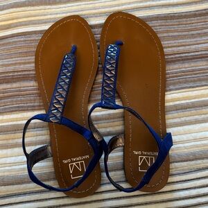 Women’s Material Girl blue with silver accents, t-strap sandals. Size 7 1/2